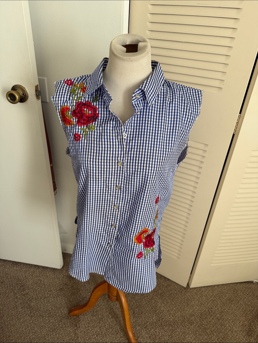 Sleeveless Blue Gingham Button-Down Top with Red Floral Embroidery